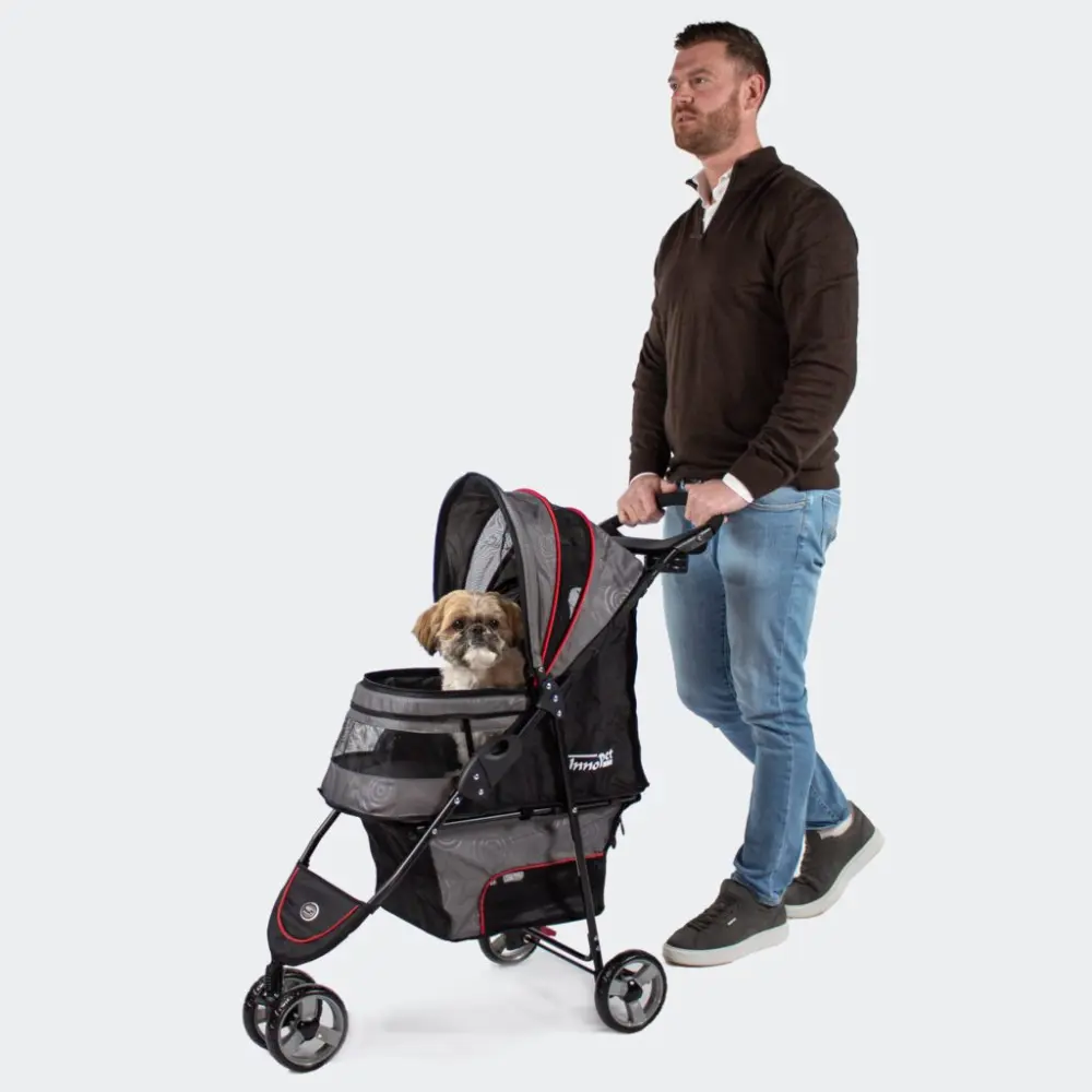 InnoPet Avenue Hundebuggy hellgrau rot mit Hund und Halter